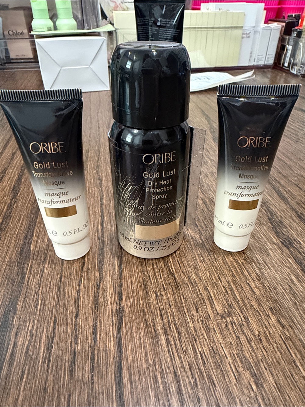 Oribe Gold Lust Protective Spray and Transformative Masque Trio